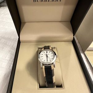 Black trim patent leather Burberry watch.. Get yourself ready for the fall ..